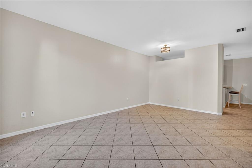 7666 Bristol Circle Naples, FL 34120 - Photo 15 of 20 a view of an empty room