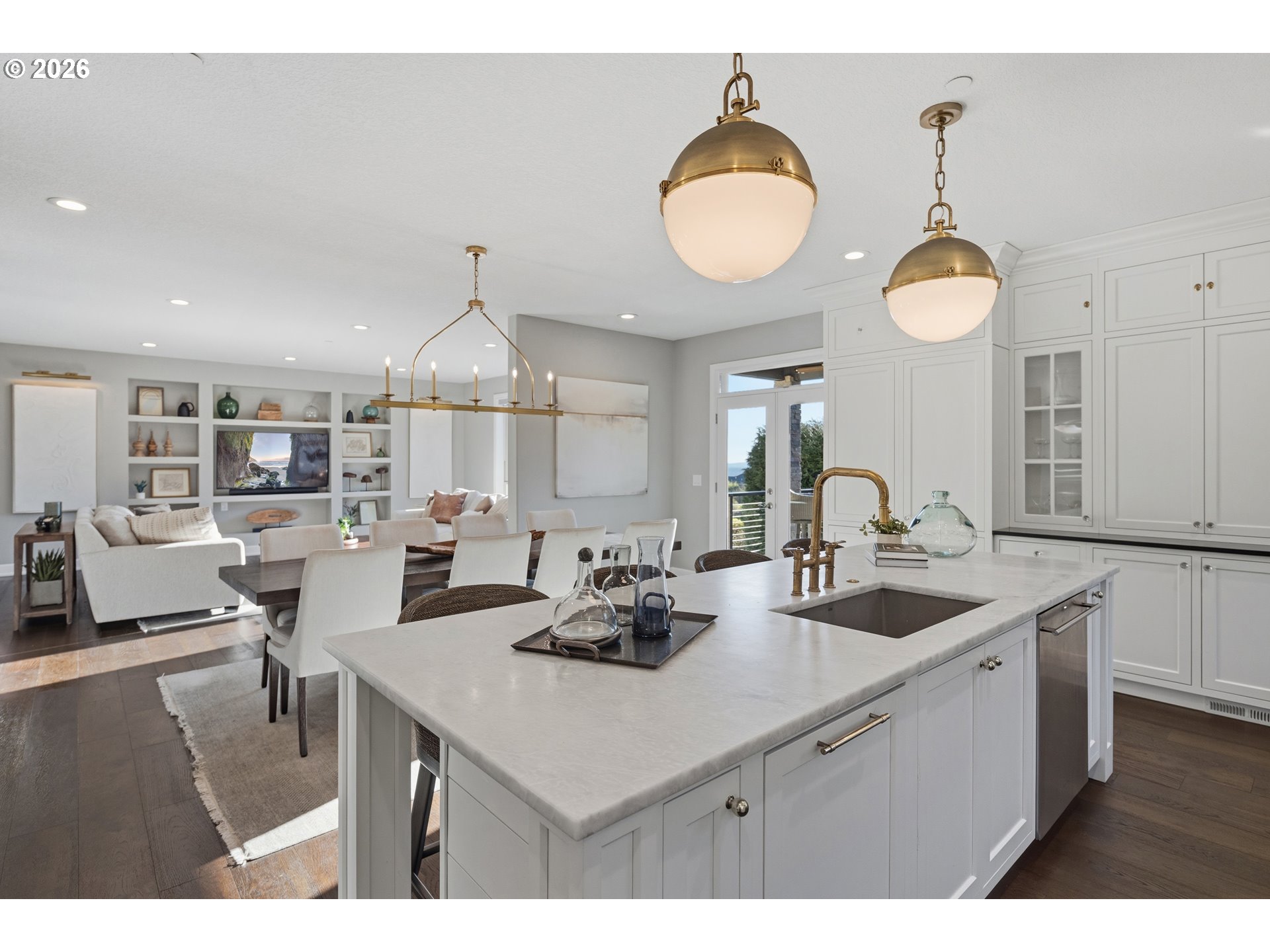 2545 Northwest 12th Circle Camas, WA 98607 - Photo 11 of 46 a kitchen with stainless steel appliances a sink a stove and a wooden floors