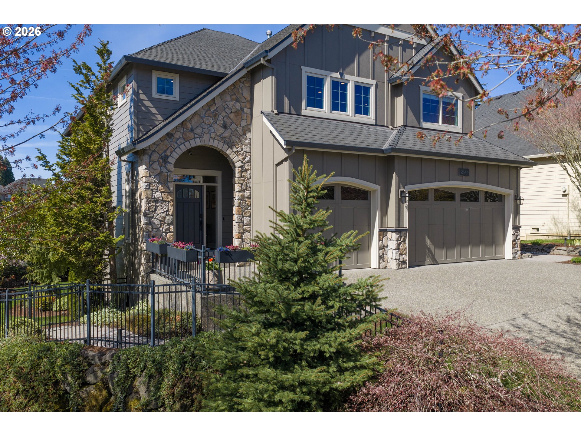 2545 Northwest 12th Circle Camas, WA 98607 - Photo 2 of 46 a front view of a house with a garden