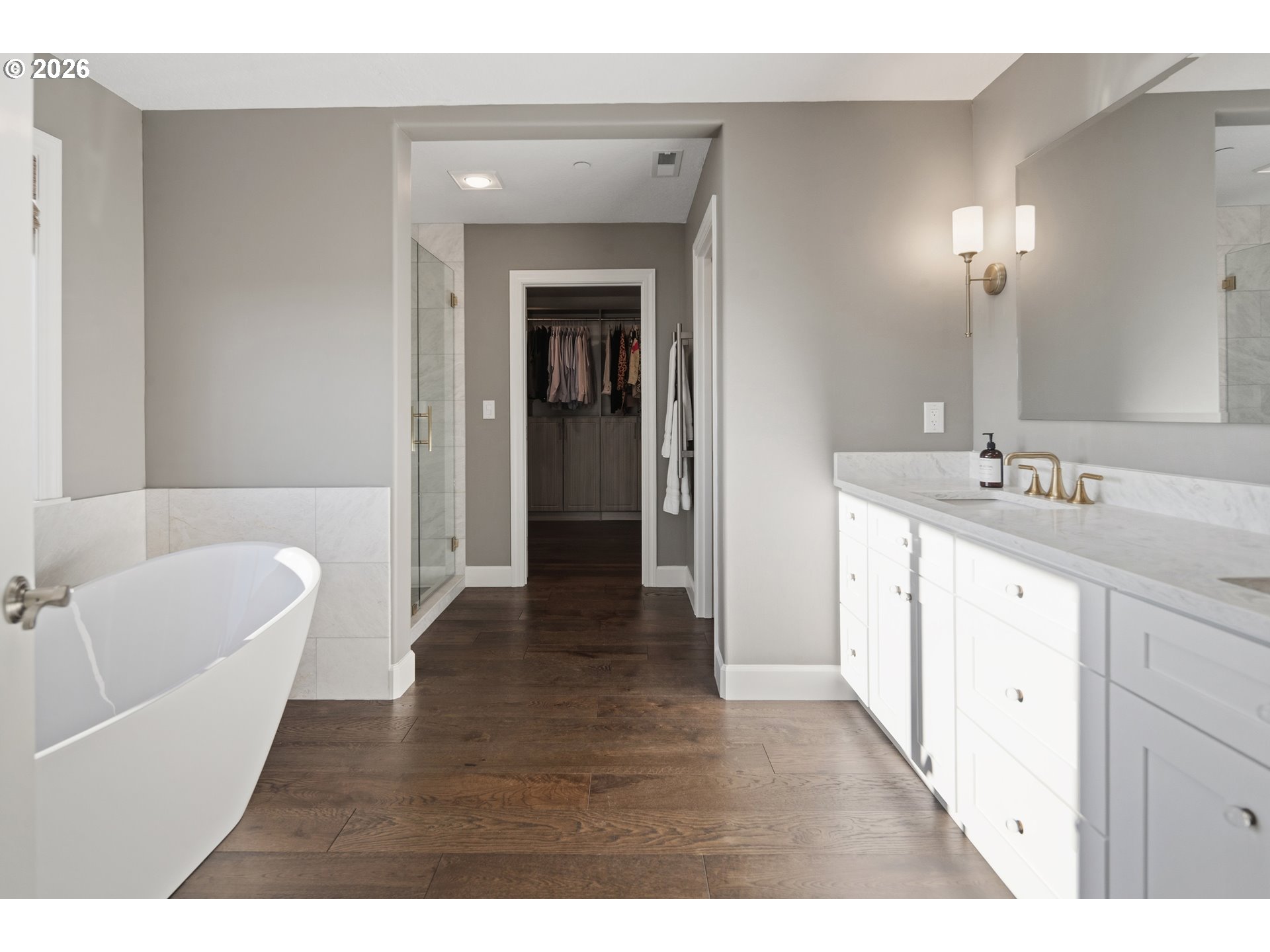 2545 Northwest 12th Circle Camas, WA 98607 - Photo 23 of 46 a bathroom with a double vanity sink a mirror and a bathtub