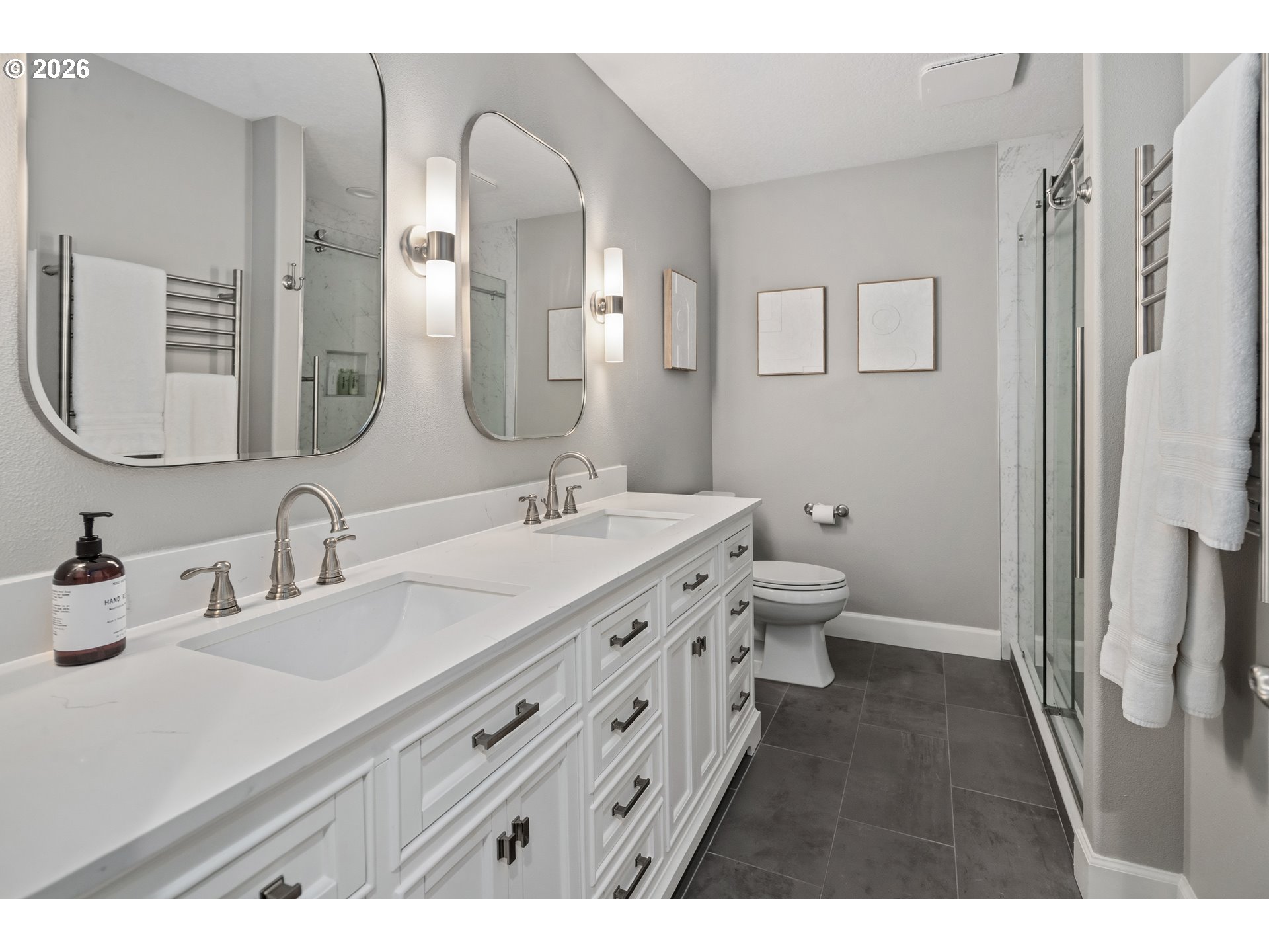 2545 Northwest 12th Circle Camas, WA 98607 - Photo 27 of 46 a bathroom with a double vanity sink and a mirror