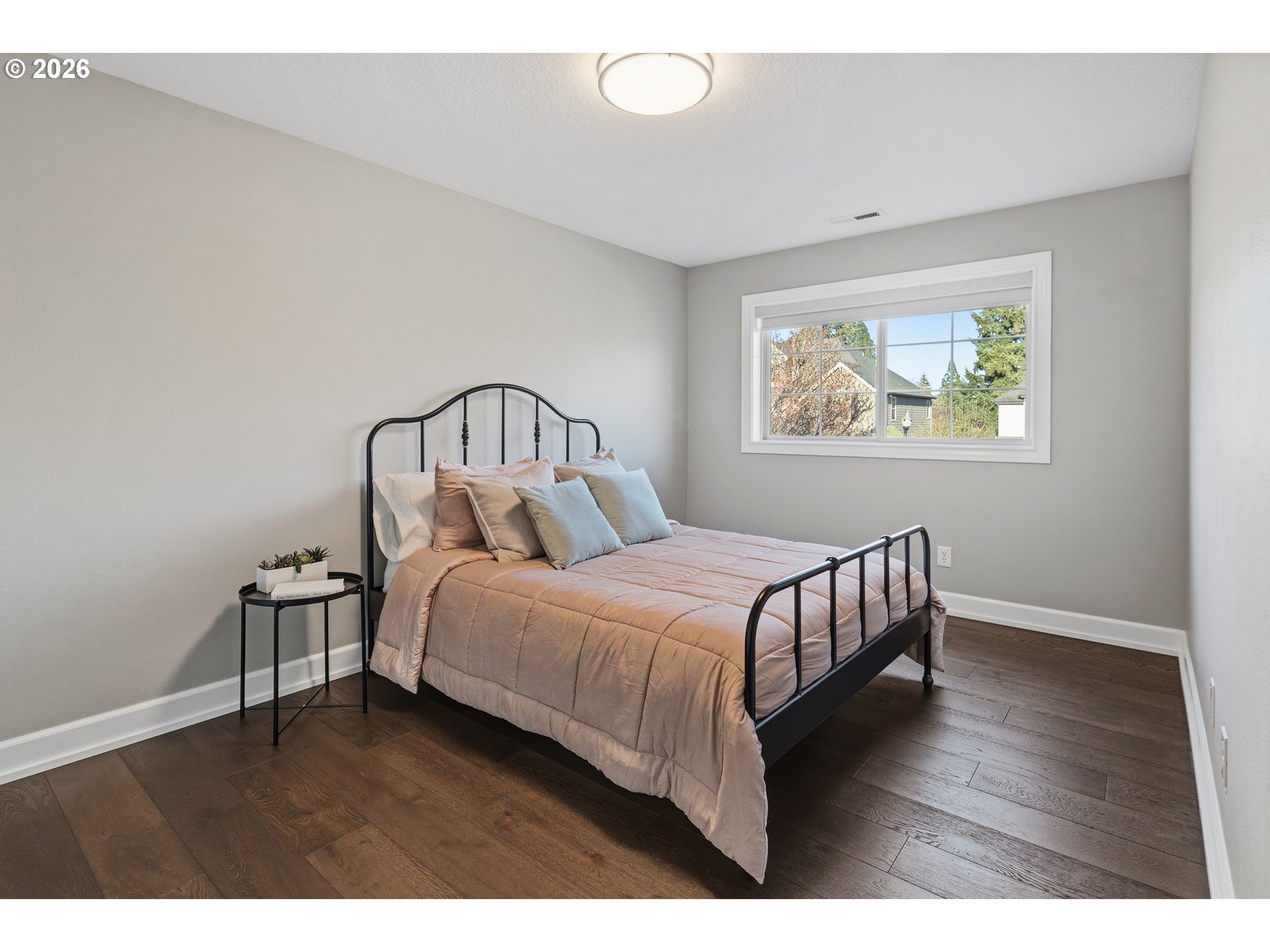 2545 Northwest 12th Circle Camas, WA 98607 - Photo 28 of 46 a bedroom with a bed paintings on the wall and a window