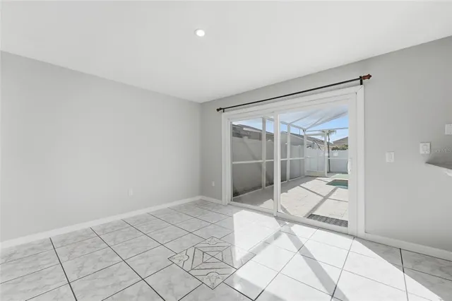 a bathroom with a shower and mirror