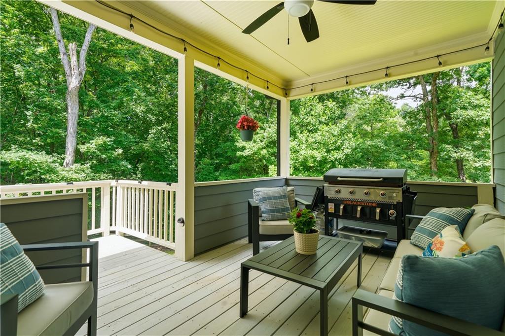 302 Spence Circle Ball Ground, GA 30107 - Photo 36 of 55 a view of a two chairs in the deck