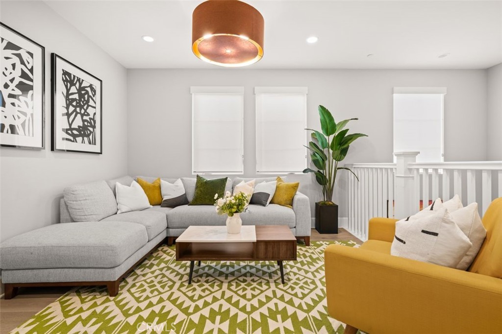 90 Rockinghorse Irvine, CA 92602 - Photo 13 of 30 a living room with furniture and a potted plant