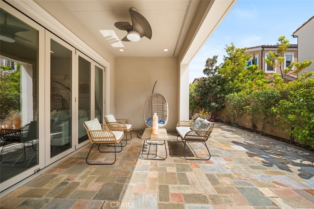 90 Rockinghorse Irvine, CA 92602 - Photo 24 of 30 a building outdoor space with patio furniture and potted plants
