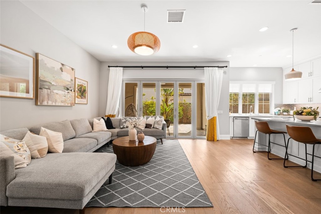 90 Rockinghorse Irvine, CA 92602 - Photo 6 of 30 a living room with furniture and a large window
