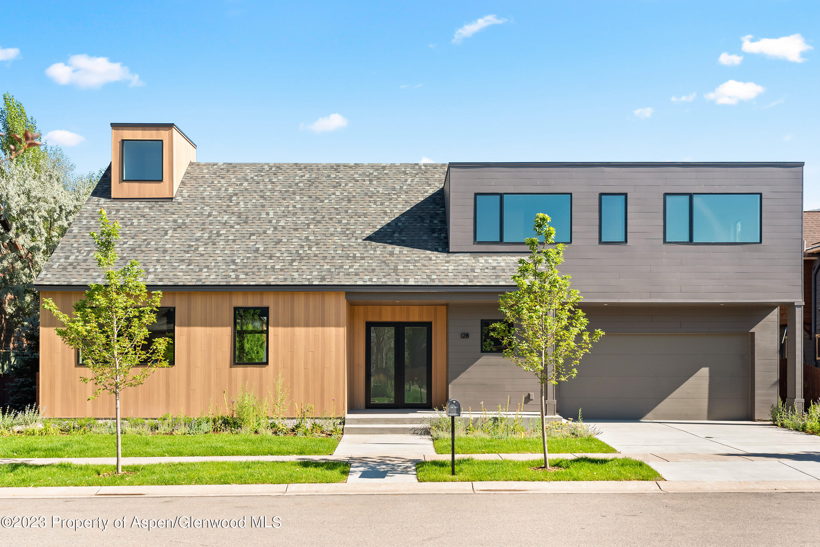128 Valley Court Basalt, CO 81621 - Photo 1 of 12 a view of a house with a yard and front view of a house