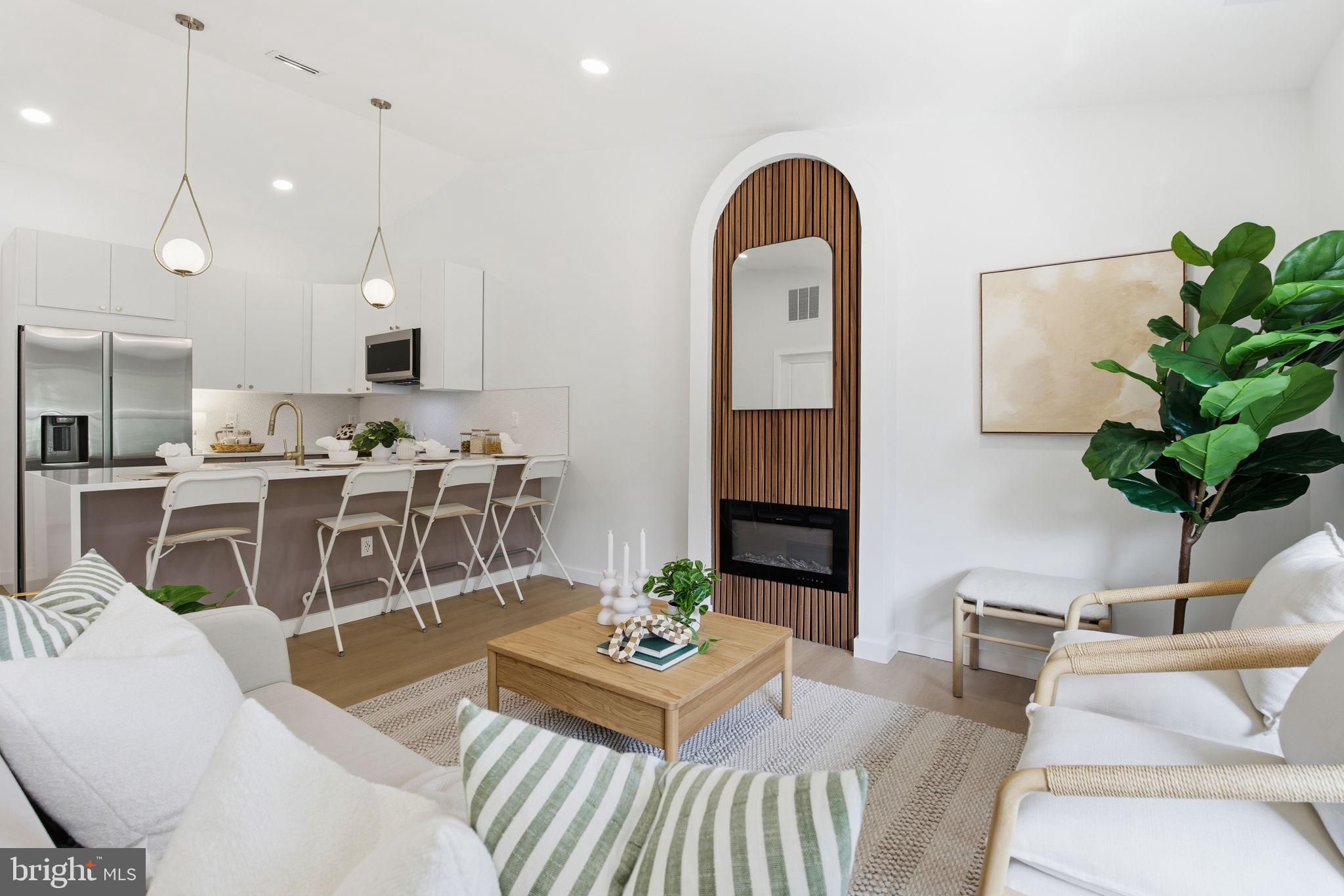 120 Haverhill Road Joppa, MD 21085 - Photo 12 of 33 a living room with furniture and a table