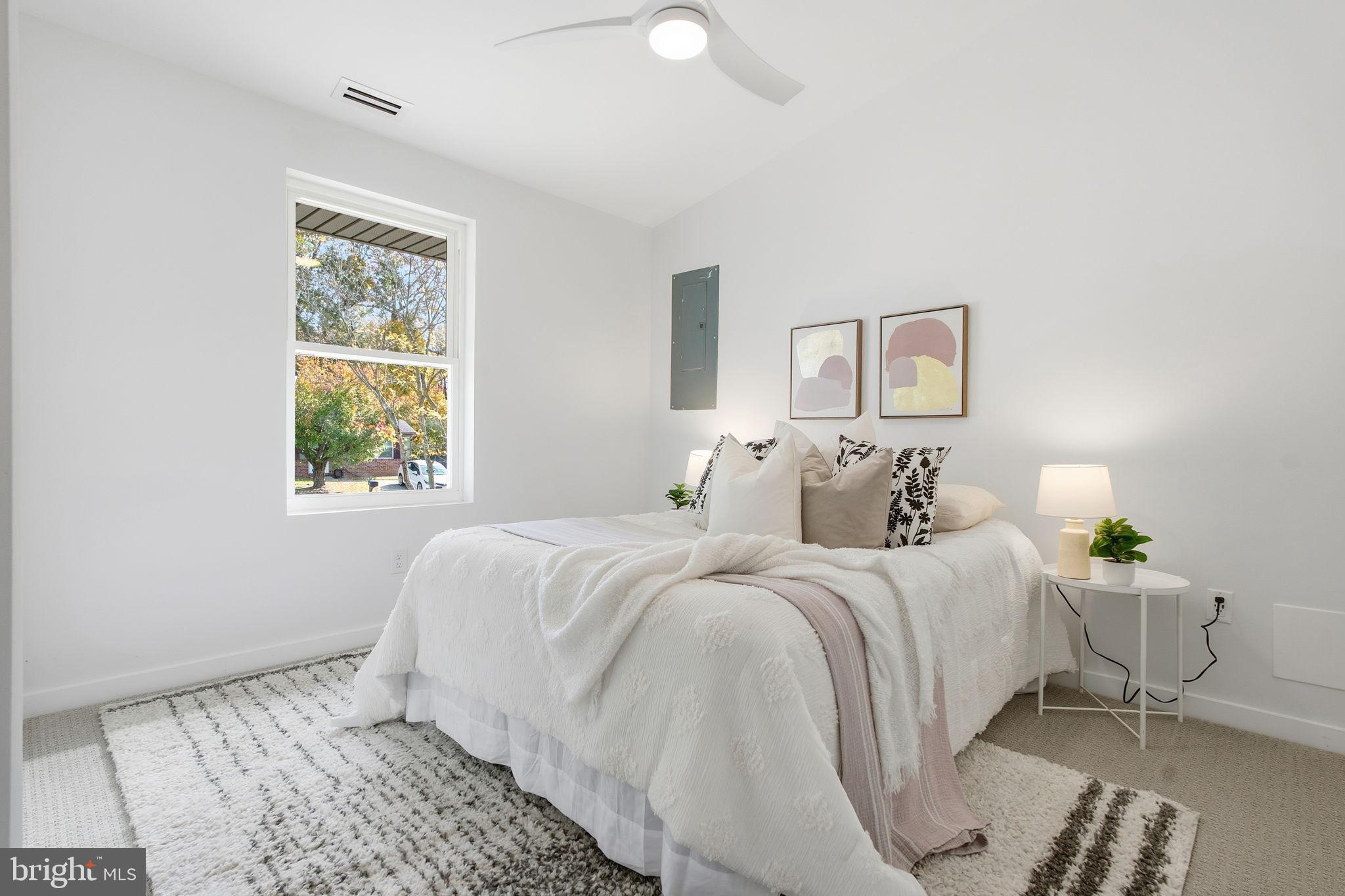 120 Haverhill Road Joppa, MD 21085 - Photo 17 of 33 a bedroom with a bed and a window
