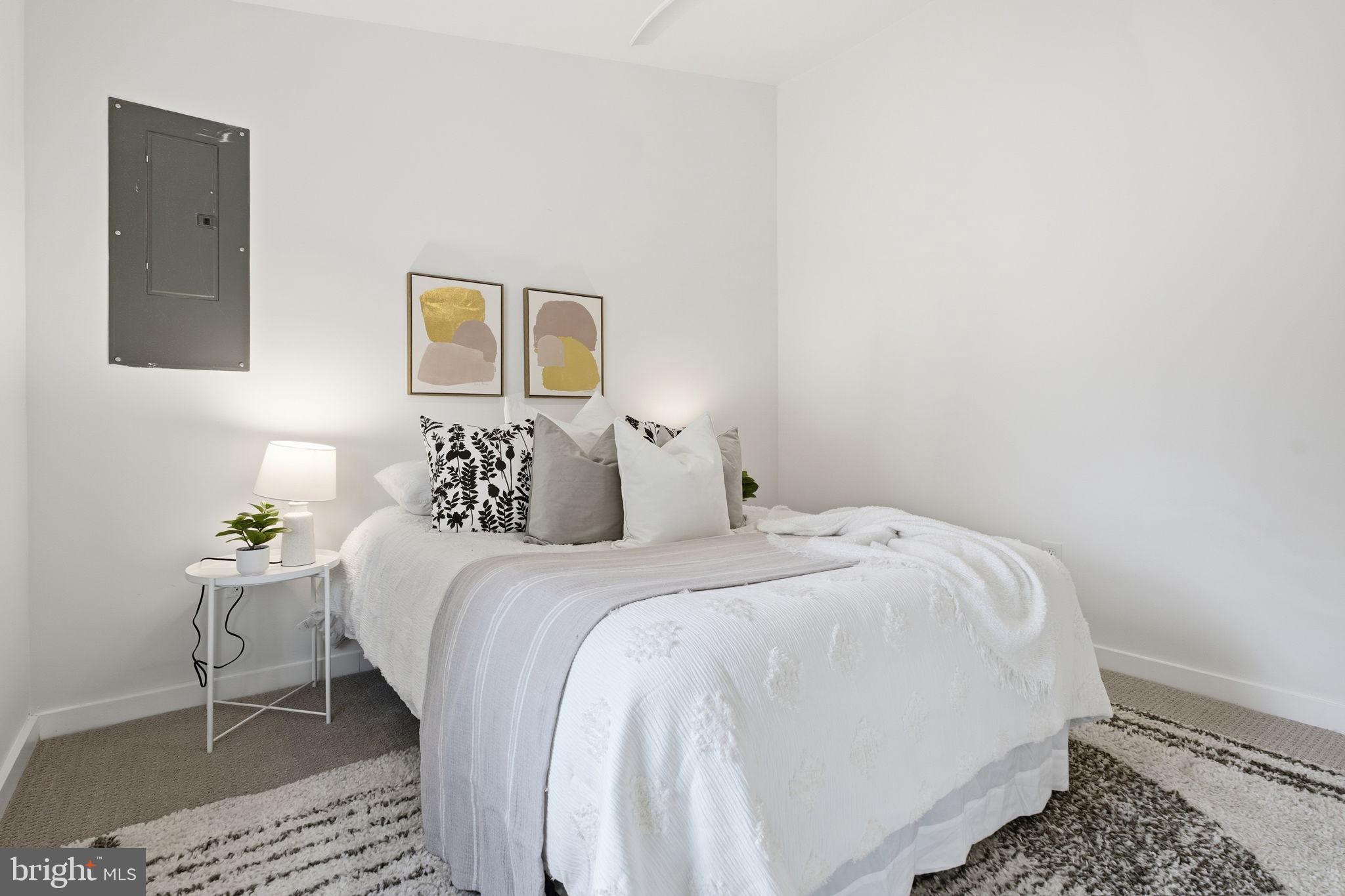 120 Haverhill Road Joppa, MD 21085 - Photo 18 of 33 a bedroom with a bed and a lamp