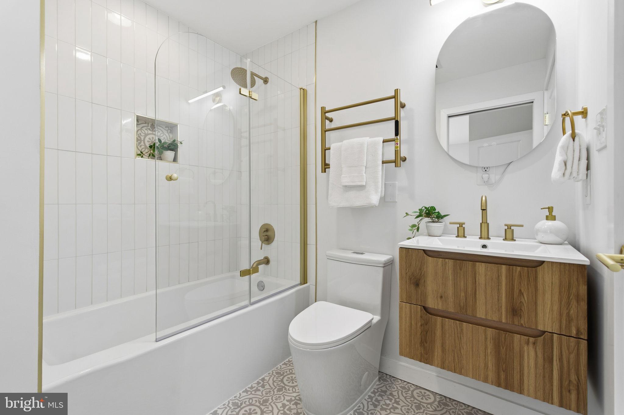 120 Haverhill Road Joppa, MD 21085 - Photo 21 of 33 a bathroom with a sink a toilet and shower