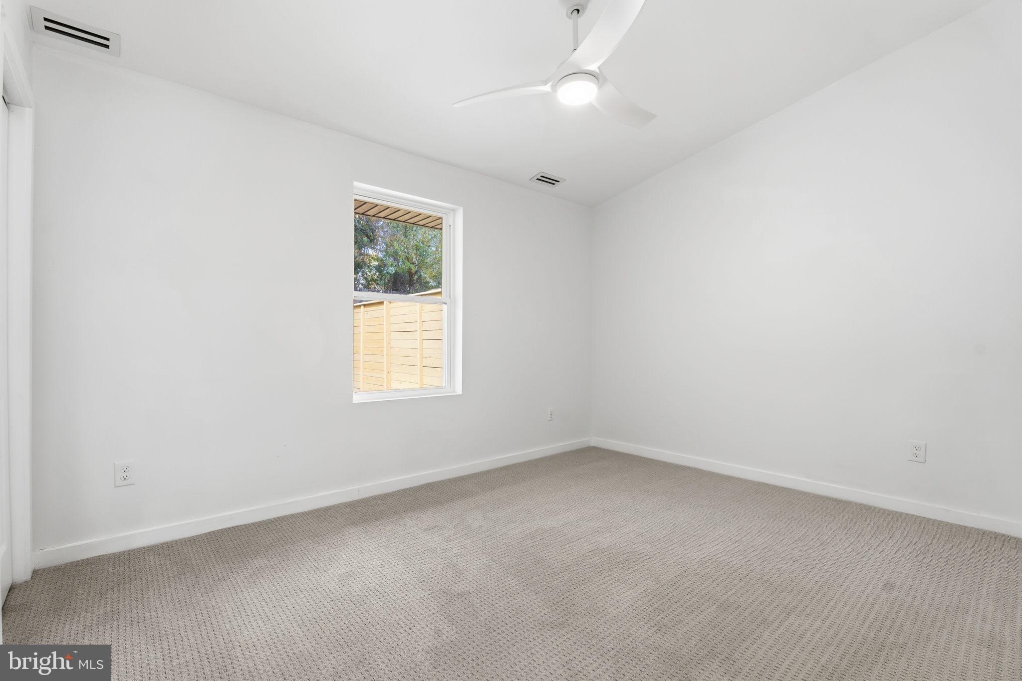 120 Haverhill Road Joppa, MD 21085 - Photo 28 of 33 an empty room with a window and a fan