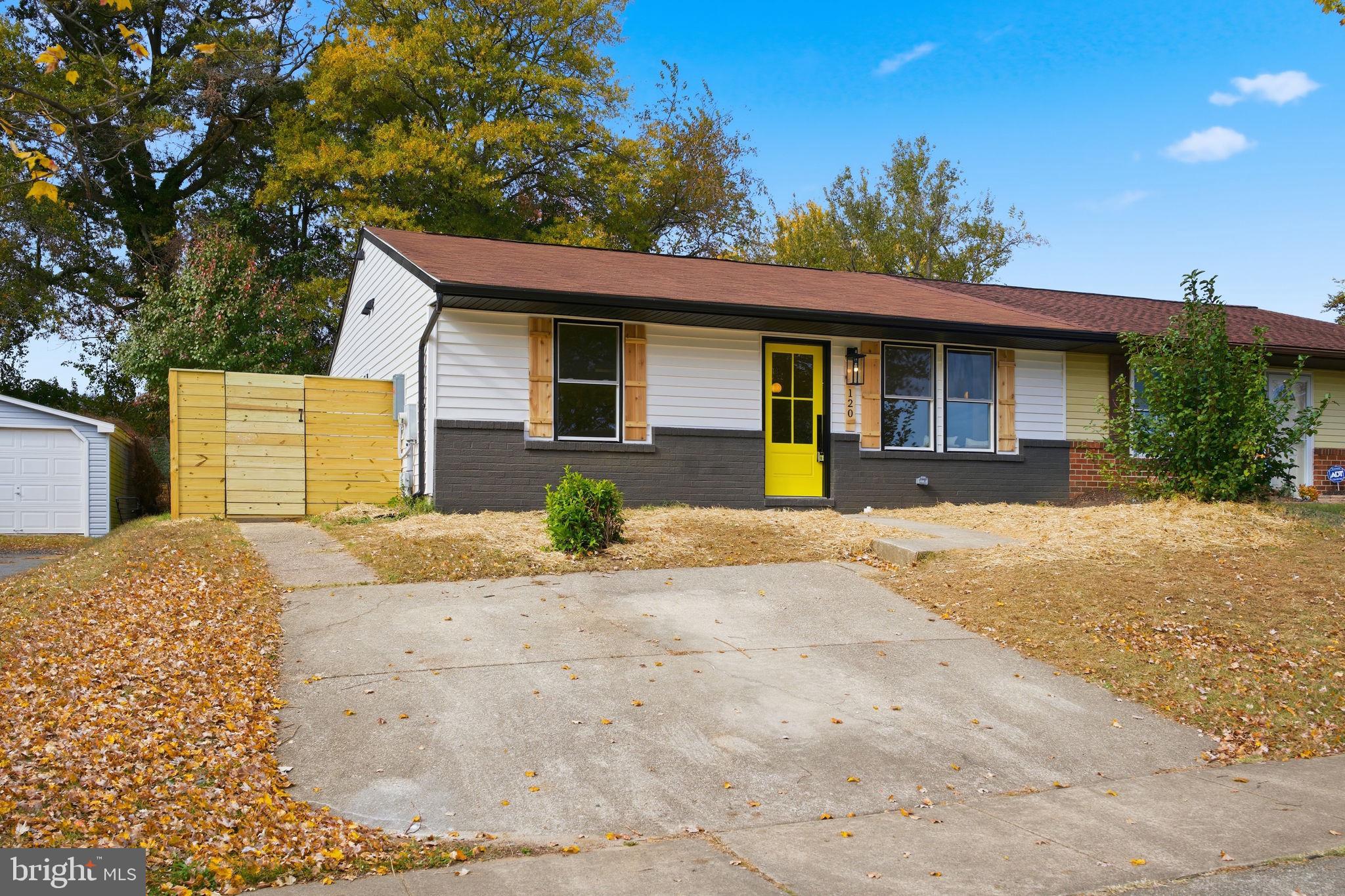 120 Haverhill Road Joppa, MD 21085 - Photo 3 of 33 a front view of a house with a yard and garage