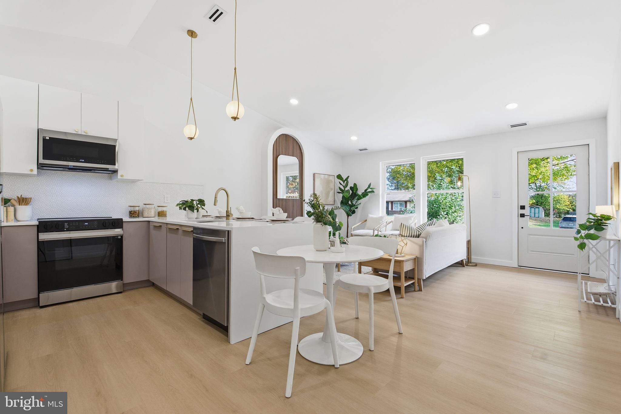 120 Haverhill Road Joppa, MD 21085 - Photo 9 of 33 a kitchen with a sink cabinets and stainless steel appliances