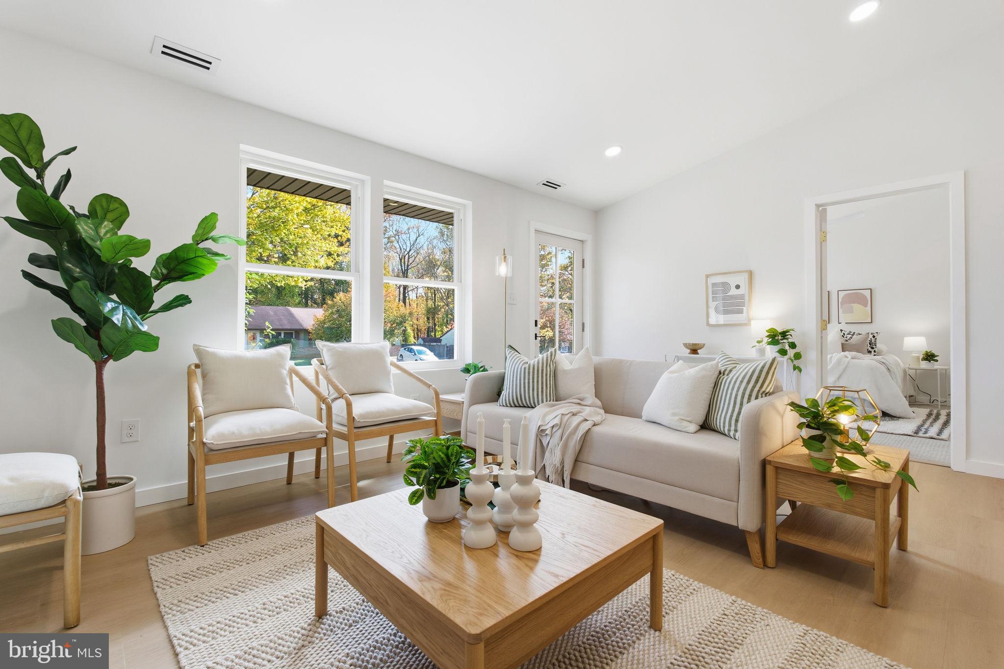 120 Haverhill Road Joppa, MD 21085 - Photo 10 of 33 a living room with furniture potted plant and a window