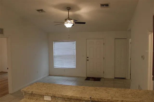 a view of empty room with a window