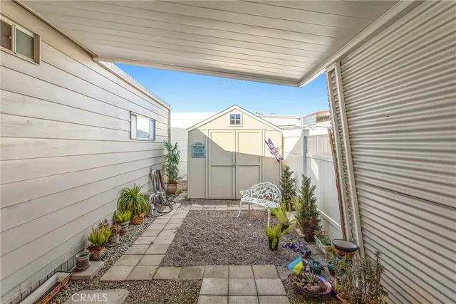 a view of a back yard of the house