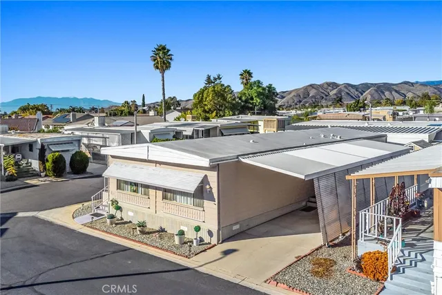 a view of a patio with swimming pool