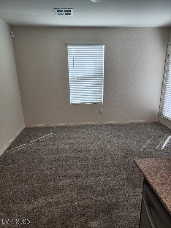 6925 Spicy Merlot Street North Las Vegas, NV 89086 - Photo 12 of 33 Carpeted empty room featuring baseboards and visib