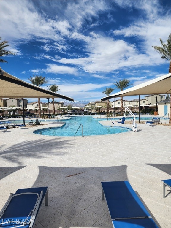 6925 Spicy Merlot Street North Las Vegas, NV 89086 - Photo 24 of 33 Community pool featuring a patio area