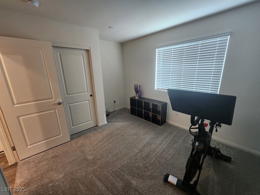 6925 Spicy Merlot Street North Las Vegas, NV 89086 - Photo 6 of 33 Exercise room with carpet flooring and baseboards