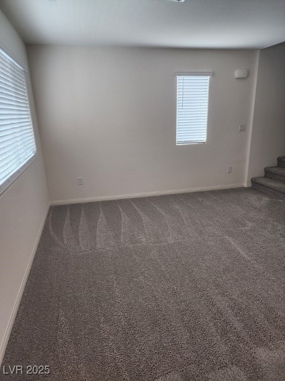 6925 Spicy Merlot Street North Las Vegas, NV 89086 - Photo 7 of 33 Carpeted spare room featuring baseboards, a health