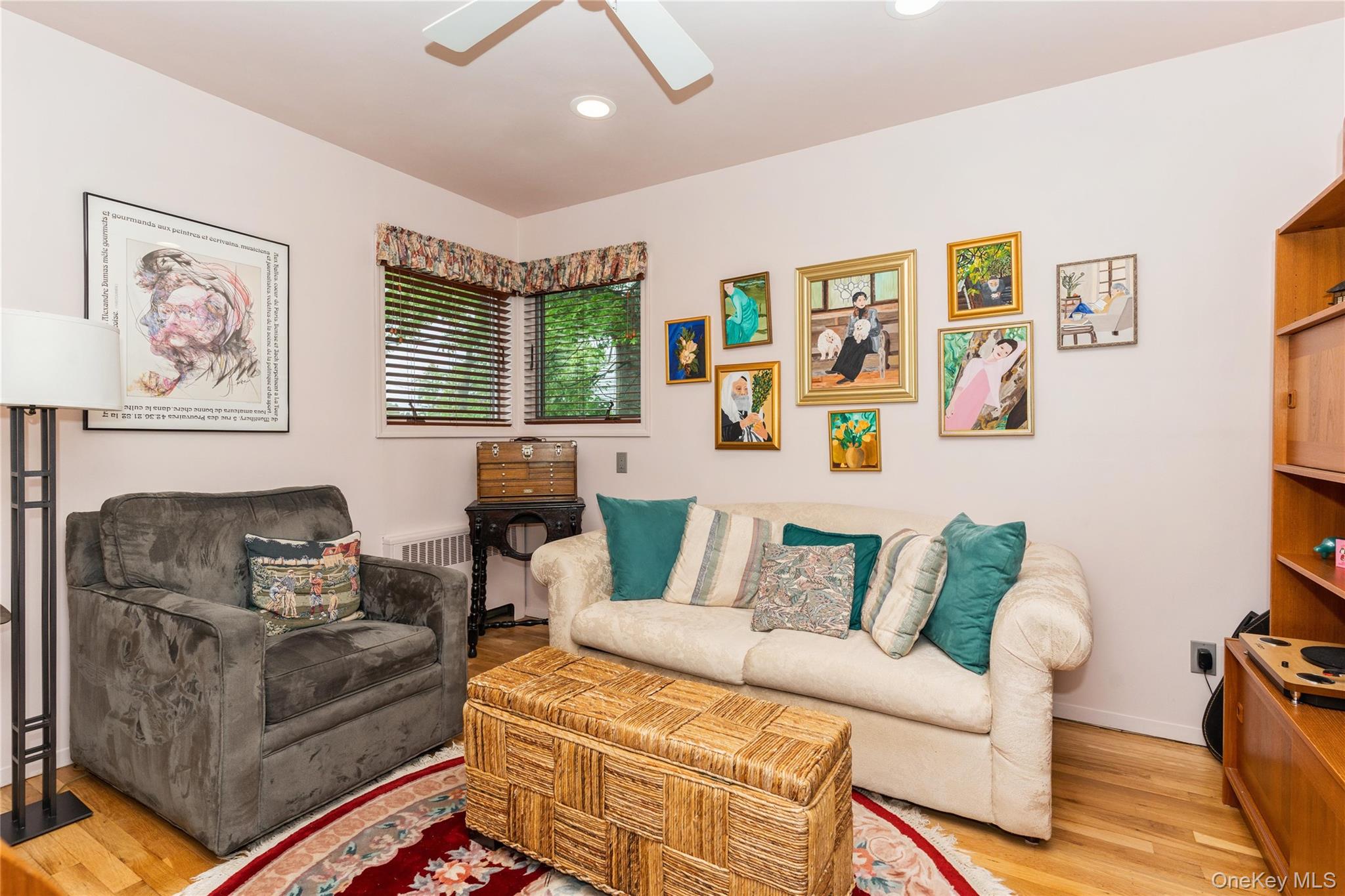 2772 Riverside Avenue Merrick, NY 11566 - Photo 13 of 45 a living room with furniture and a large window