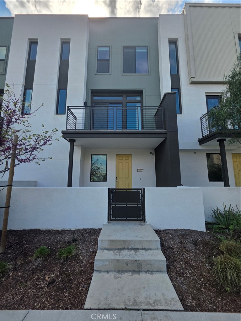 120 Rondo Irvine, CA 92618 - Photo 1 of 23 a front view of a house with a yard