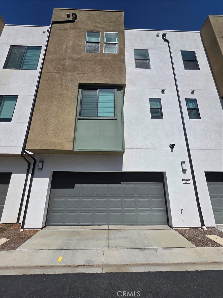 120 Rondo Irvine, CA 92618 - Photo 19 of 23 a view of a building with car parked