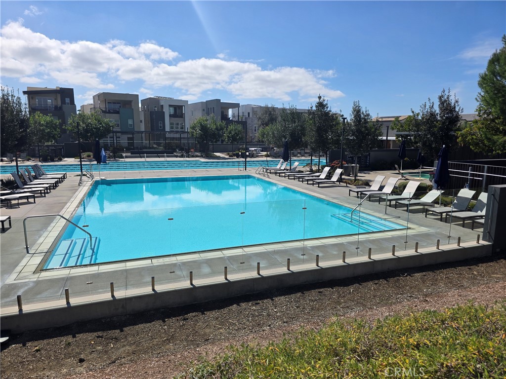 120 Rondo Irvine, CA 92618 - Photo 21 of 23 a view of swimming pool with outdoor seating and plants