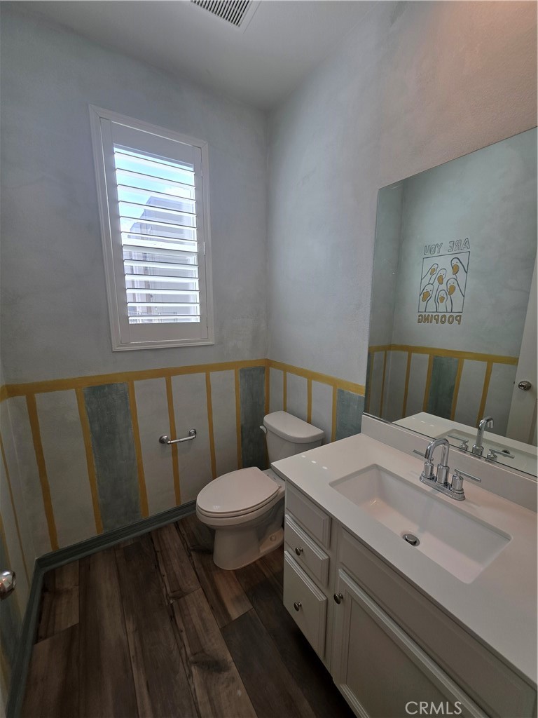 120 Rondo Irvine, CA 92618 - Photo 6 of 23 a bathroom with a sink and a mirror