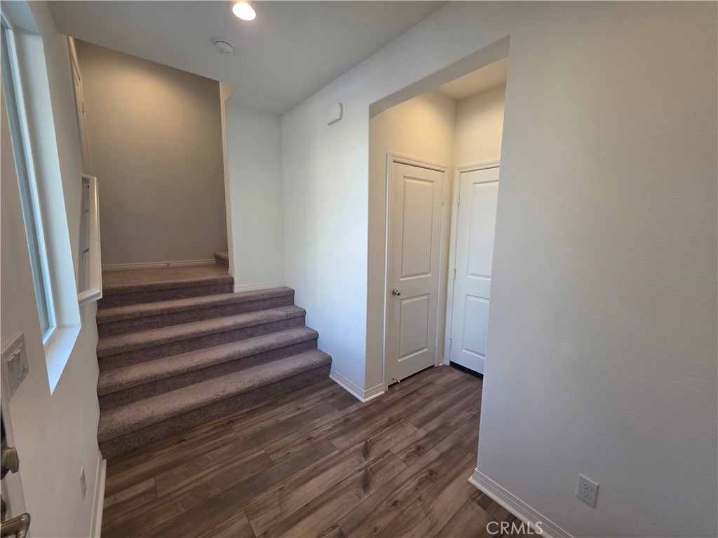 120 Rondo Irvine, CA 92618 - Photo 7 of 23 a view of entryway with wooden floor