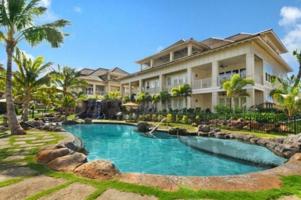 2373 Ho'ohu Road, Unit E111 Koloa, HI 96756 - Photo 12 of 16 a front view of a house with garden