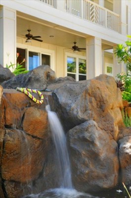 2373 Ho'ohu Road, Unit E111 Koloa, HI 96756 - Photo 14 of 16 a view of a house with a patio