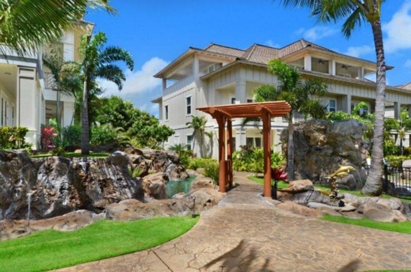 2373 Ho'ohu Road, Unit E111 Koloa, HI 96756 - Photo 15 of 16 a front view of a house with garden