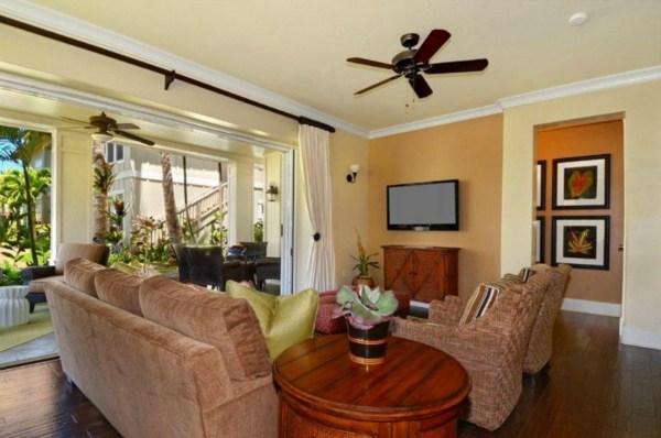 2373 Ho'ohu Road, Unit E111 Koloa, HI 96756 - Photo 4 of 16 a living room with furniture and a large window