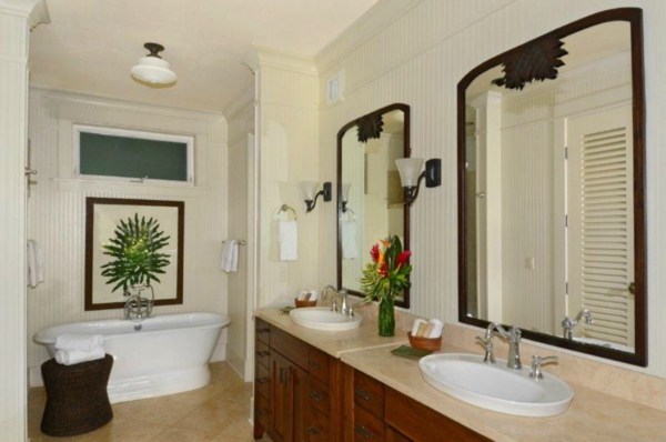 2373 Ho'ohu Road, Unit E111 Koloa, HI 96756 - Photo 6 of 16 a bathroom with a granite countertop sink a mirror and a bathtub