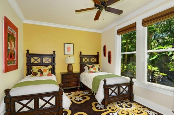 2373 Ho'ohu Road, Unit E111 Koloa, HI 96756 - Photo 7 of 16 a bedroom with a bed and a table