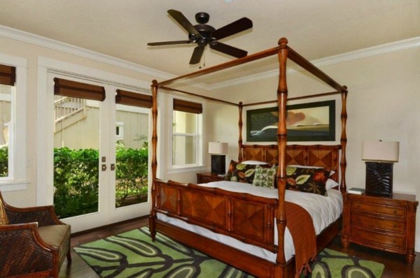 2373 Ho'ohu Road, Unit E111 Koloa, HI 96756 - Photo 8 of 16 a bedroom with furniture and a window