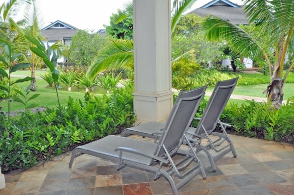 2373 Ho'ohu Road, Unit E111 Koloa, HI 96756 - Photo 9 of 16 a view of backyard with outdoor seating and plants