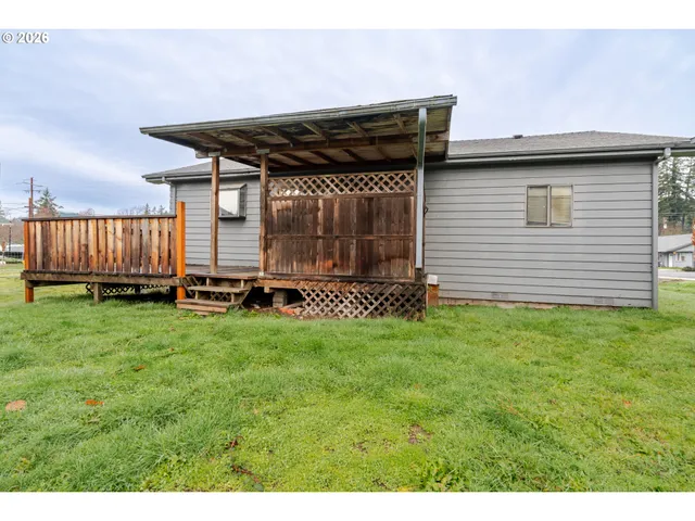 a backyard of a house with lots of green space