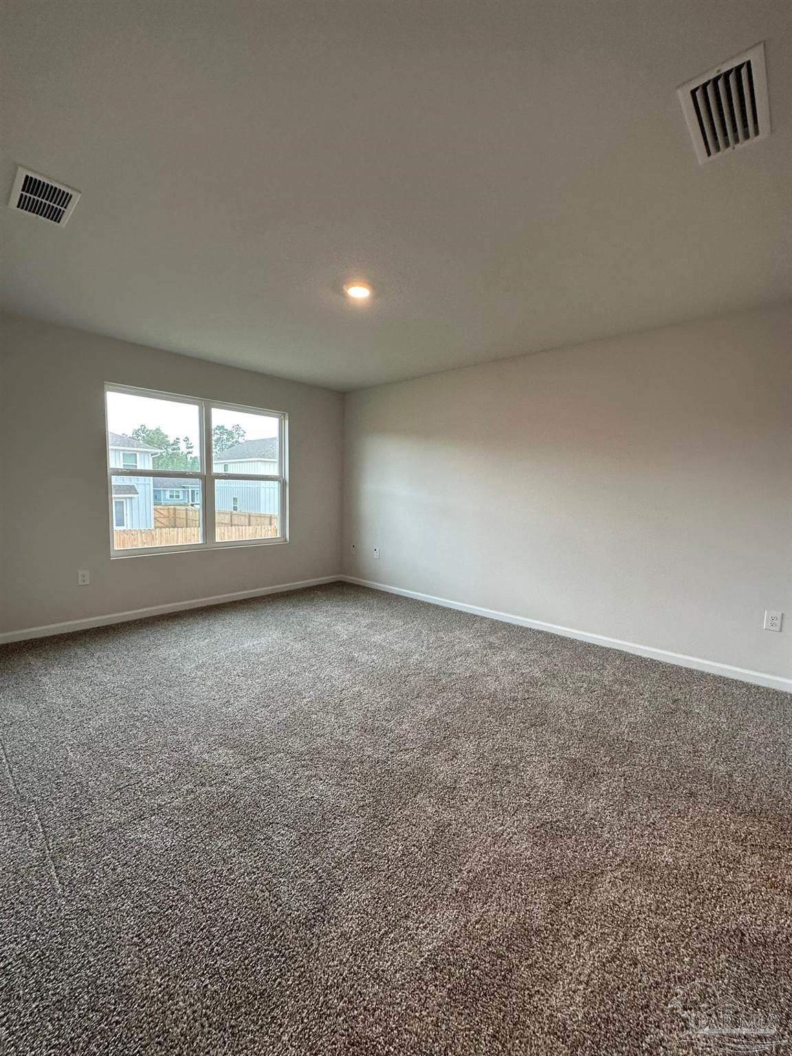 4378 Redbay Court Pace, FL 32571 - Photo 19 of 30 an empty room with a window
