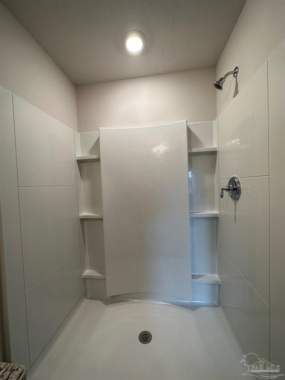 4378 Redbay Court Pace, FL 32571 - Photo 23 of 30 a bathroom with a shower