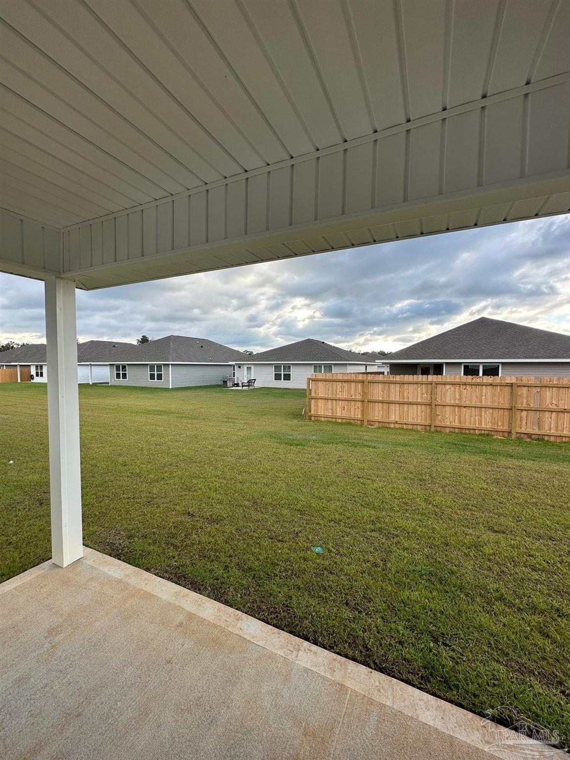4378 Redbay Court Pace, FL 32571 - Photo 28 of 30 a view of a big room with an outdoor space