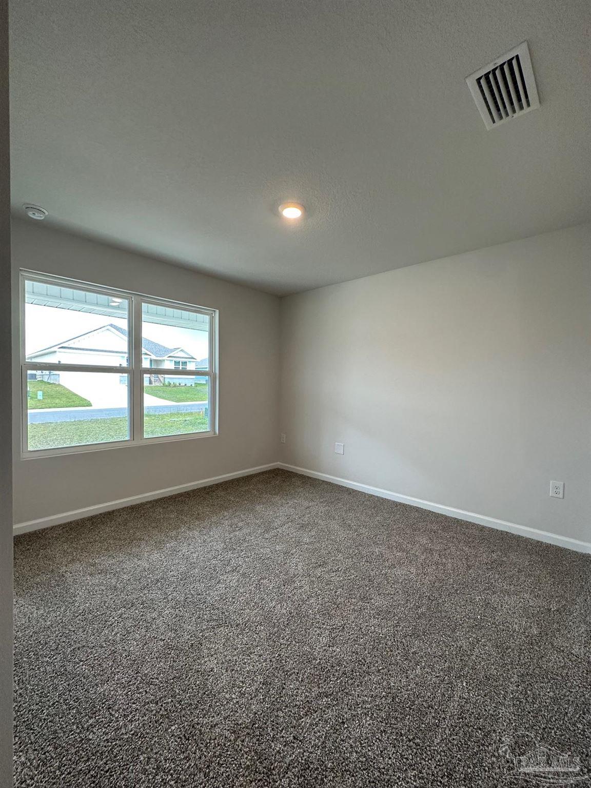 4378 Redbay Court Pace, FL 32571 - Photo 5 of 30 an empty room with windows
