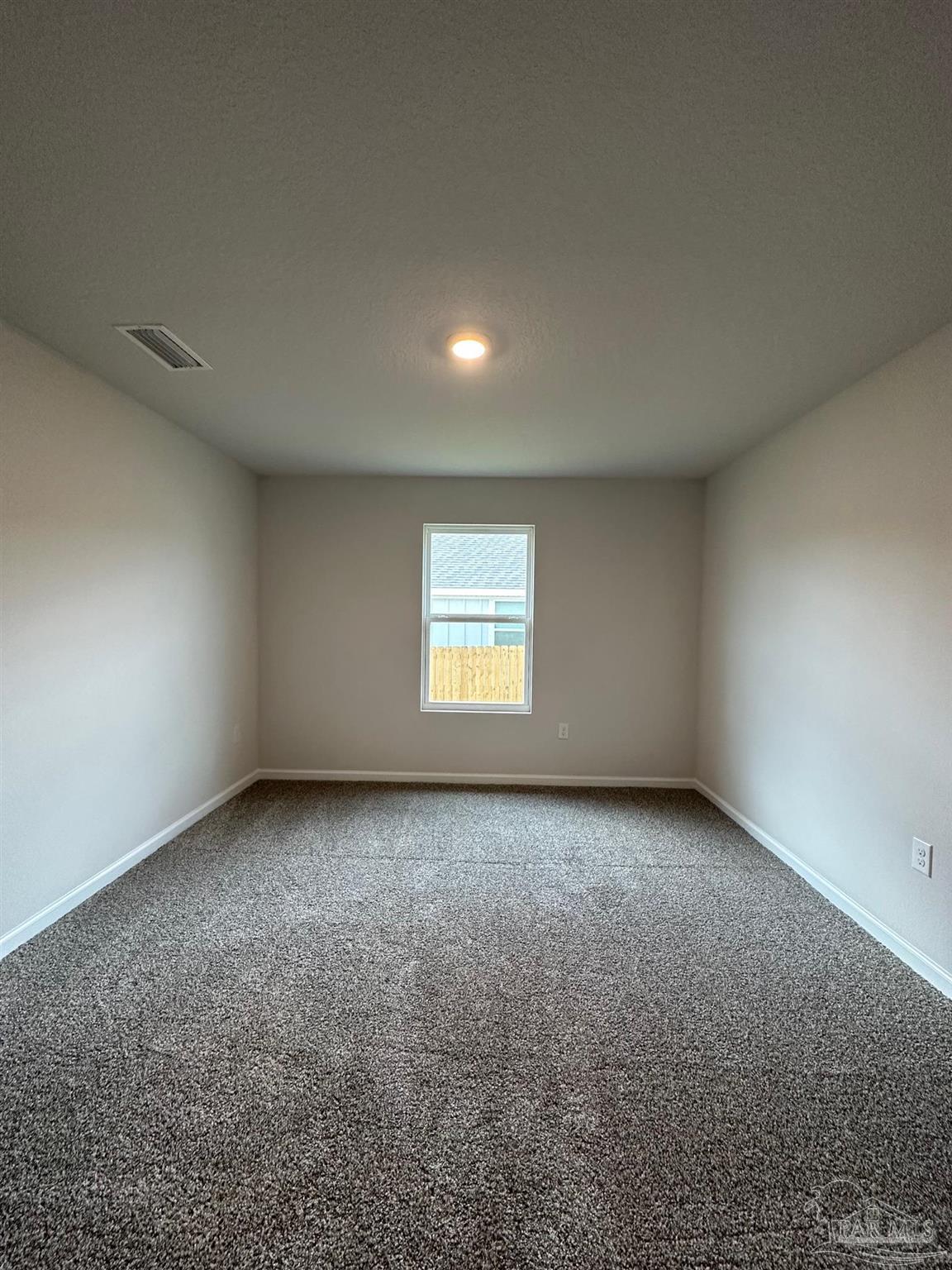 4378 Redbay Court Pace, FL 32571 - Photo 8 of 30 a view of an empty room and window