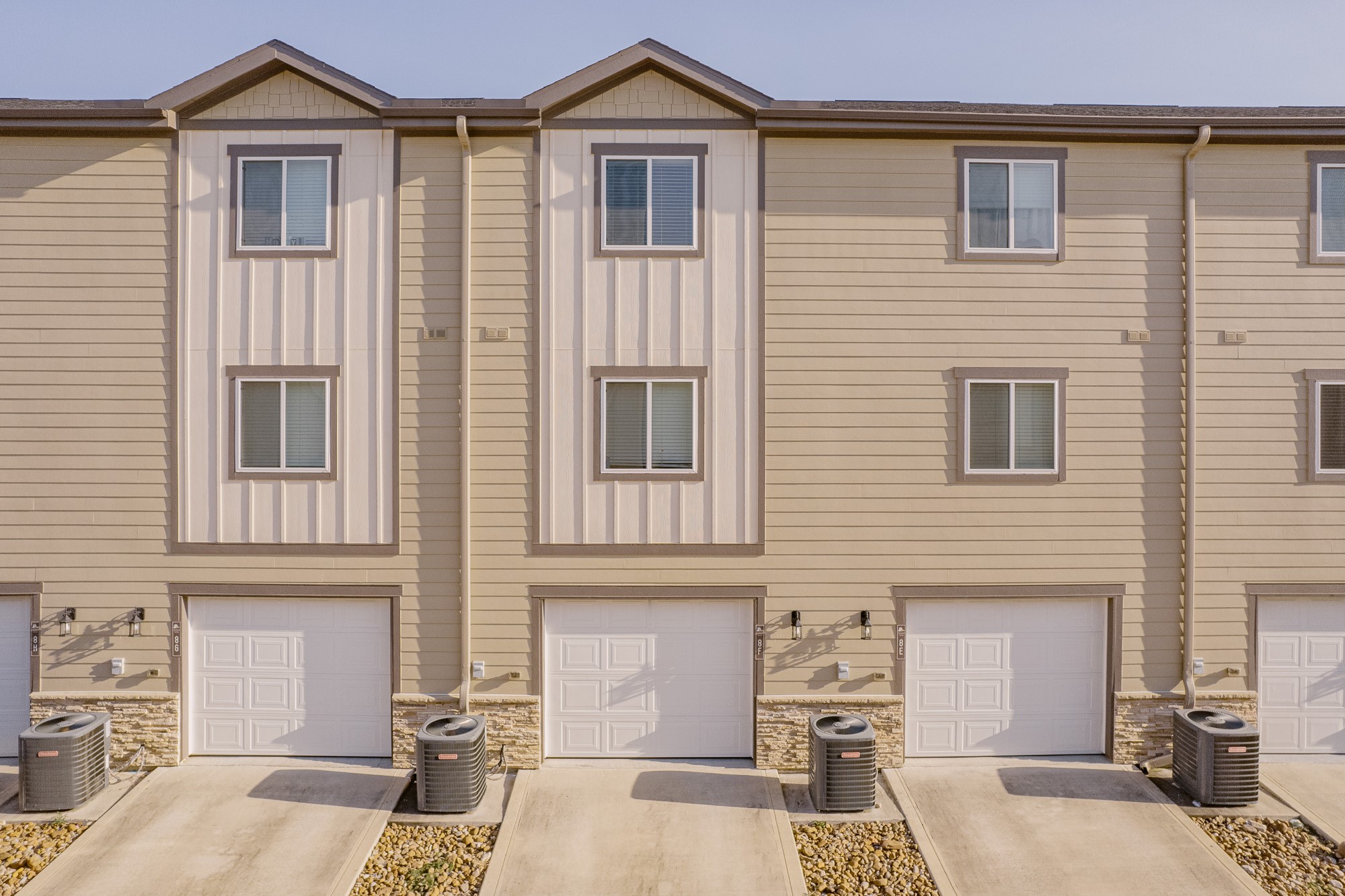 12603 Telge Road, Unit 13E Cypress, TX 77429 - Photo 29 of 32 a front view of a house with many windows