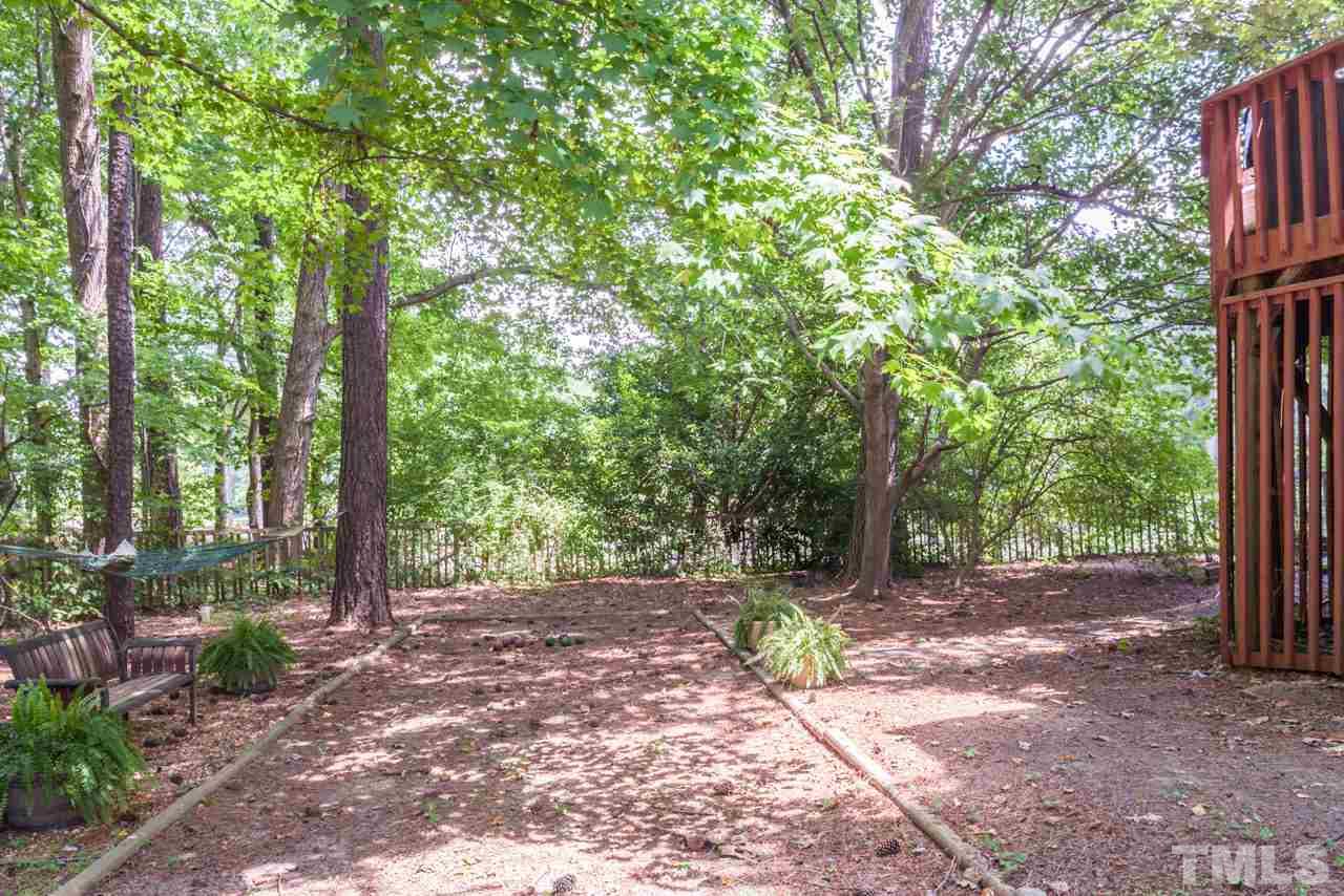 10001 Goodview Court Raleigh, NC 27613 - Photo 18 of 25 shaded, low-maintenance, fenced-in back yard
