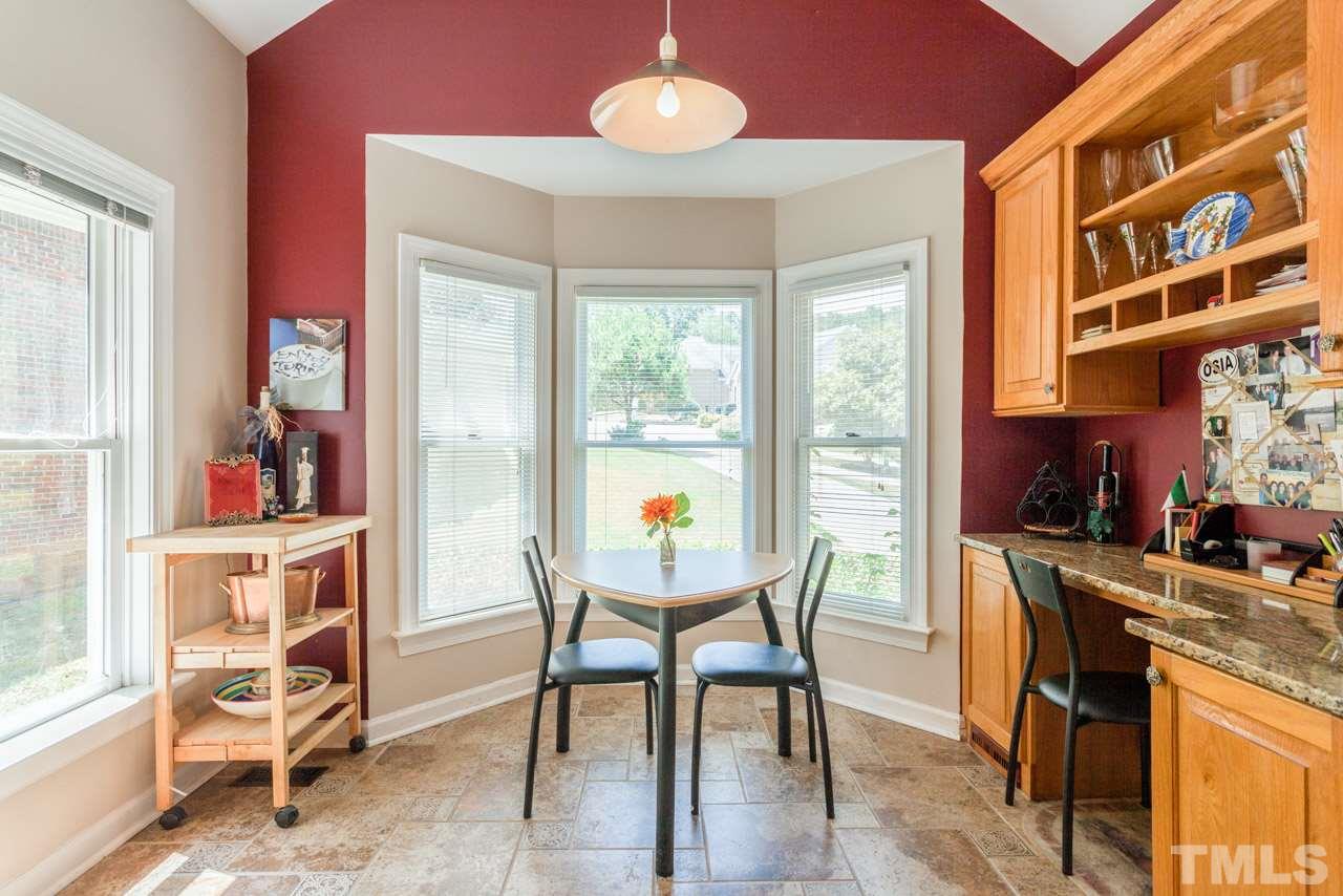 10001 Goodview Court Raleigh, NC 27613 - Photo 7 of 25 Bright breakfast nook with built in work station